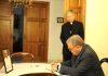 Speaker signs the Book of Condolences following the passing of His Holiness Pope Francis