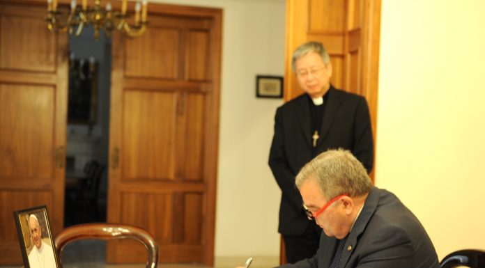 Speaker signs the Book of Condolences following the passing of His Holiness Pope Francis