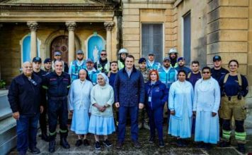 Law enforcement officers collect and distribute food to those in need