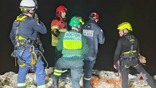 Civil Protection rescue climber near Red Tower