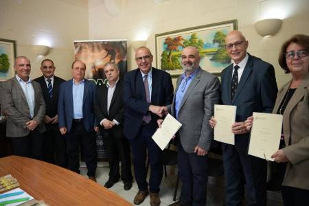 Minister Michael Falzon